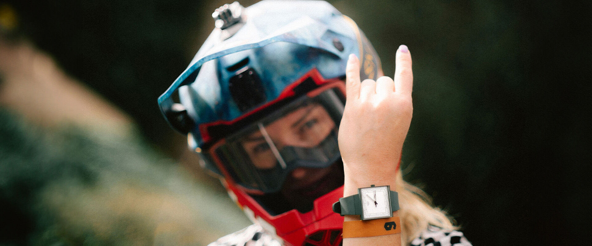 Proteam rider Casey Brown throwing up hand horns